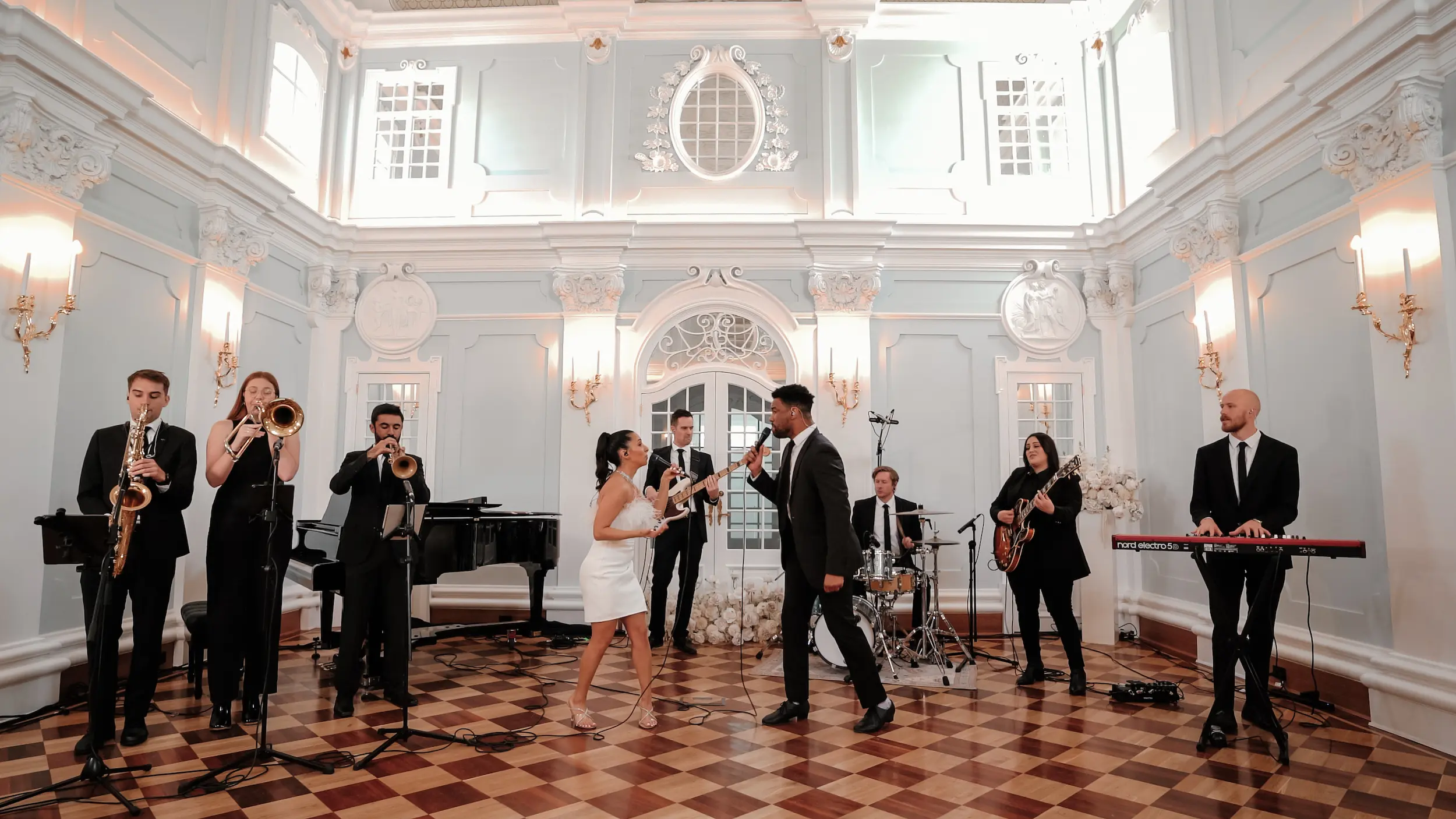 Band of musicians singing in classy hall located in Adelaide, South Australia.